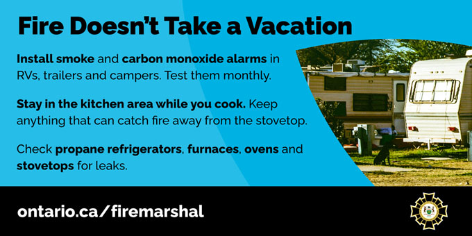 Fire safety image reminder to test trailer smoke and carbon monoxide alarms
